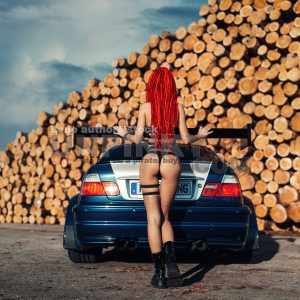 Sexy naked woman with supercar