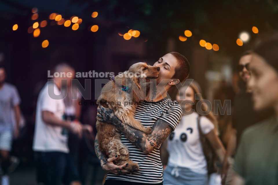 Modern tattooed girl walking with her Cocker Spaniel puppy