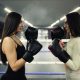 Two girls at the ring face to face before fight