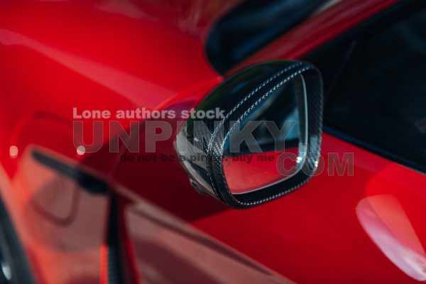 Modern sport car carbon rear view mirror
