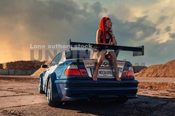 Sexy woman with sportcar