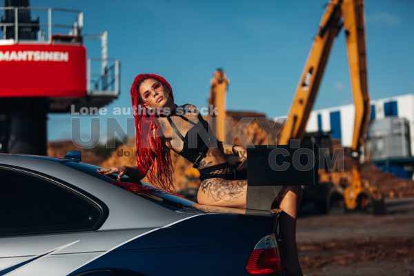 Sexy woman with sportcar