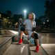 Sexy girl sitting on a skateboard