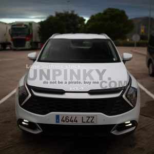 KIA Sportage brand new at the parking of petrol station