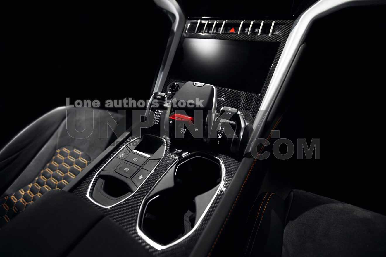 Super Car Button Supercar carbon dashboard interior in dark with start and stop button ...
