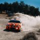 Mitsubishi Lancer Evolution 5 in motion with clouds of dust. The Rally car makes a turn at the high speed | Editorial