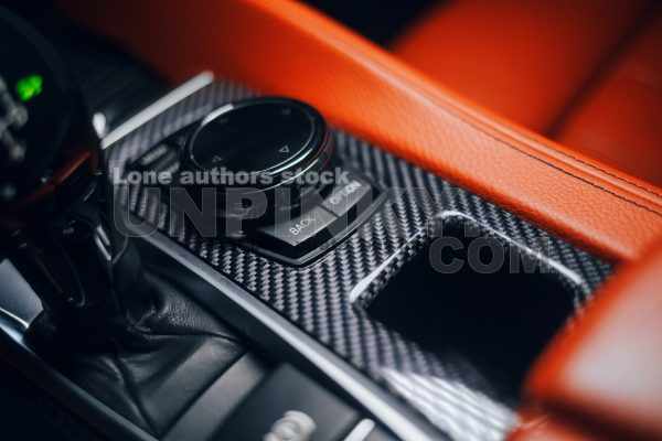 Modern car carbon panel with multimedia panel