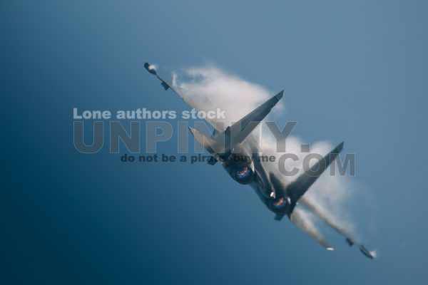 Modern tactical jet fighter at the sky