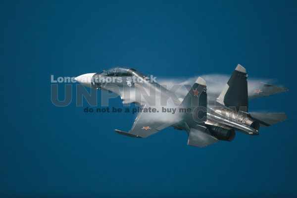 Modern tactical jet fighter at the sky