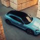 Porsche Taycan Turbo S Cross Turismo at the wood factory | Editorial