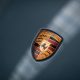 Porsche logo at the trunk of supercar | Editorial