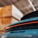 Porsche Taycan 4S logo at the trunk | Editorial