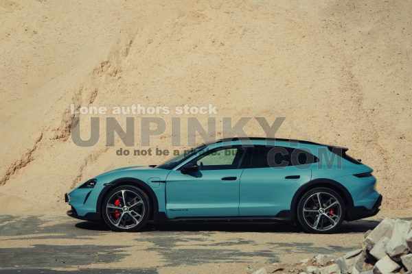 Porsche Taycan Turbo S Cross Turismo at the wood factory