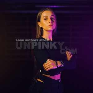 Portrait of sporty young girl with neon glow