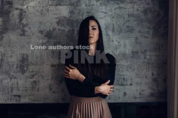 Portrait of an attractive woman at the darkroom