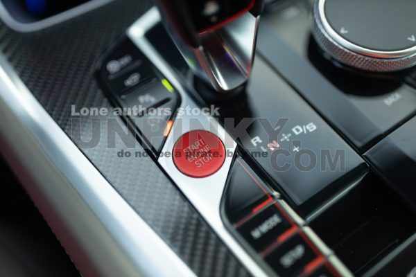 Luxury car engine start and stop button