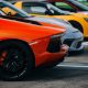 Supercars at the parking lot. Track day at the race track. Fast cars prepared for ride at the raceway