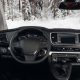 Modern SUV car interior with the leather panel, multimedia, and dashboard