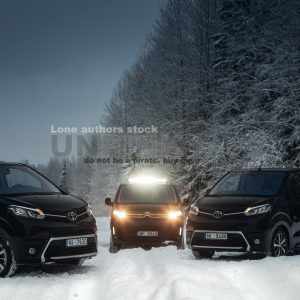 Group of vans go expedition at the snow forest