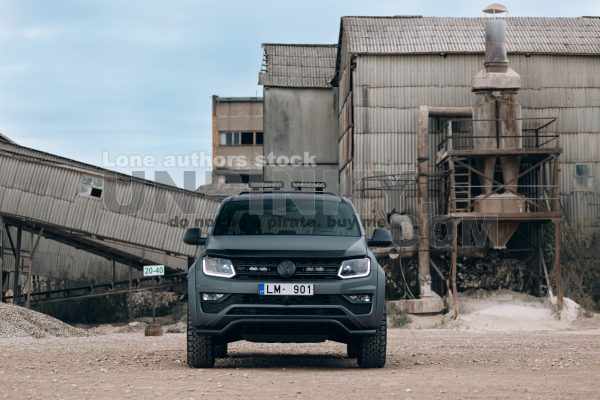 Volkswagen Amarok Aventura 4MOTION 3.0 V6 TDI front side at gravel extraction