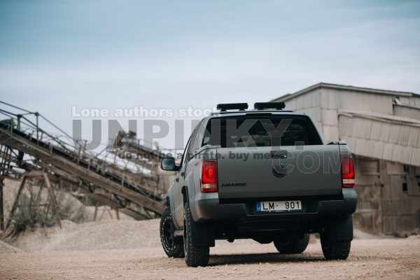 Volkswagen Amarok Aventura 4MOTION 3.0 V6 TDI front side at gravel extraction