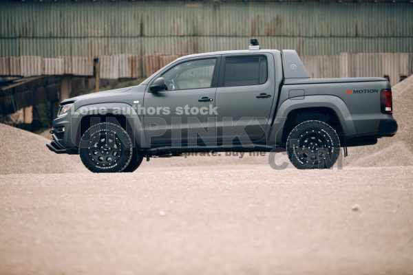 Volkswagen Amarok Aventura 4MOTION 3.0 V6 TDI front side at gravel extraction