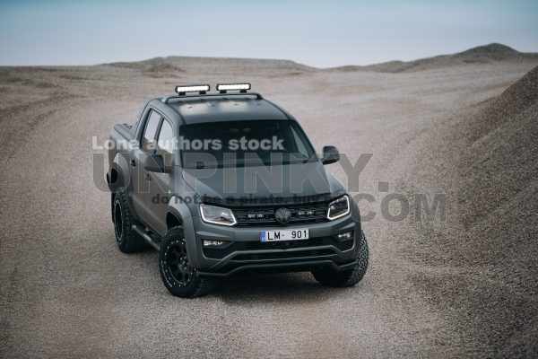 Volkswagen Amarok Aventura 4MOTION 3.0 V6 TDI front side at gravel extraction