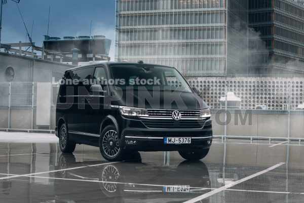 New Volkswagen Multivan T7 on the parking of modern district
