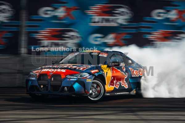 BMW M4 Red Bull car going fast with drift
