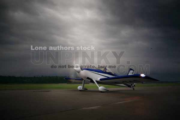 Small plane taxiing to runway and ready for take off