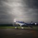Small plane taxiing to runway and ready for take off