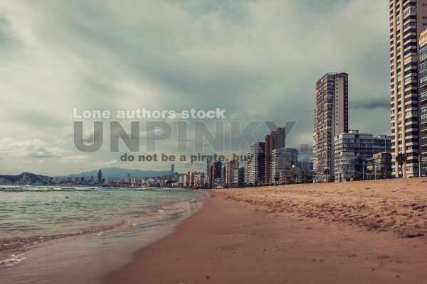 Resort town coastline with tall buildings