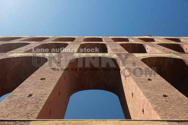 Old aqueduct arch over a dried up river near the Spanish city of Nerja