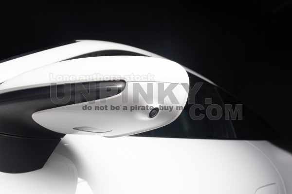 Rear view camera lens at the car mirror. Car parking assistance
