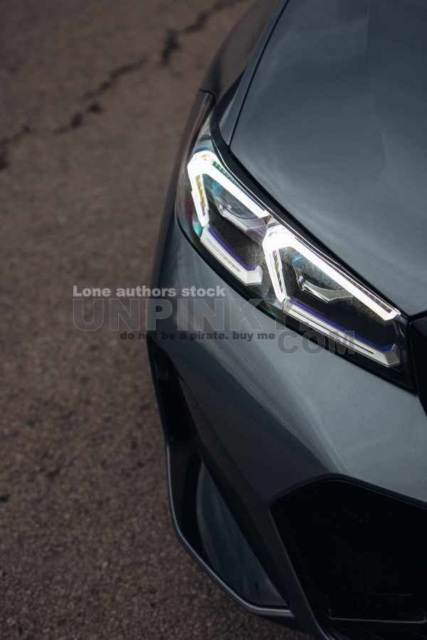 Laser headlight of modern luxury car close up